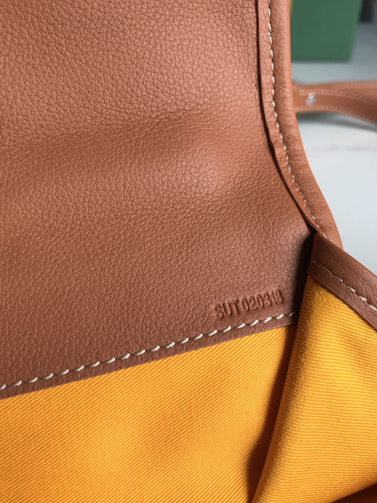 GOYARD SAINT LÉGER BACKPACK 35 IN BROWN GOYARDINE CANVAS AND CALFSKIN WITH CARTOON PATCH