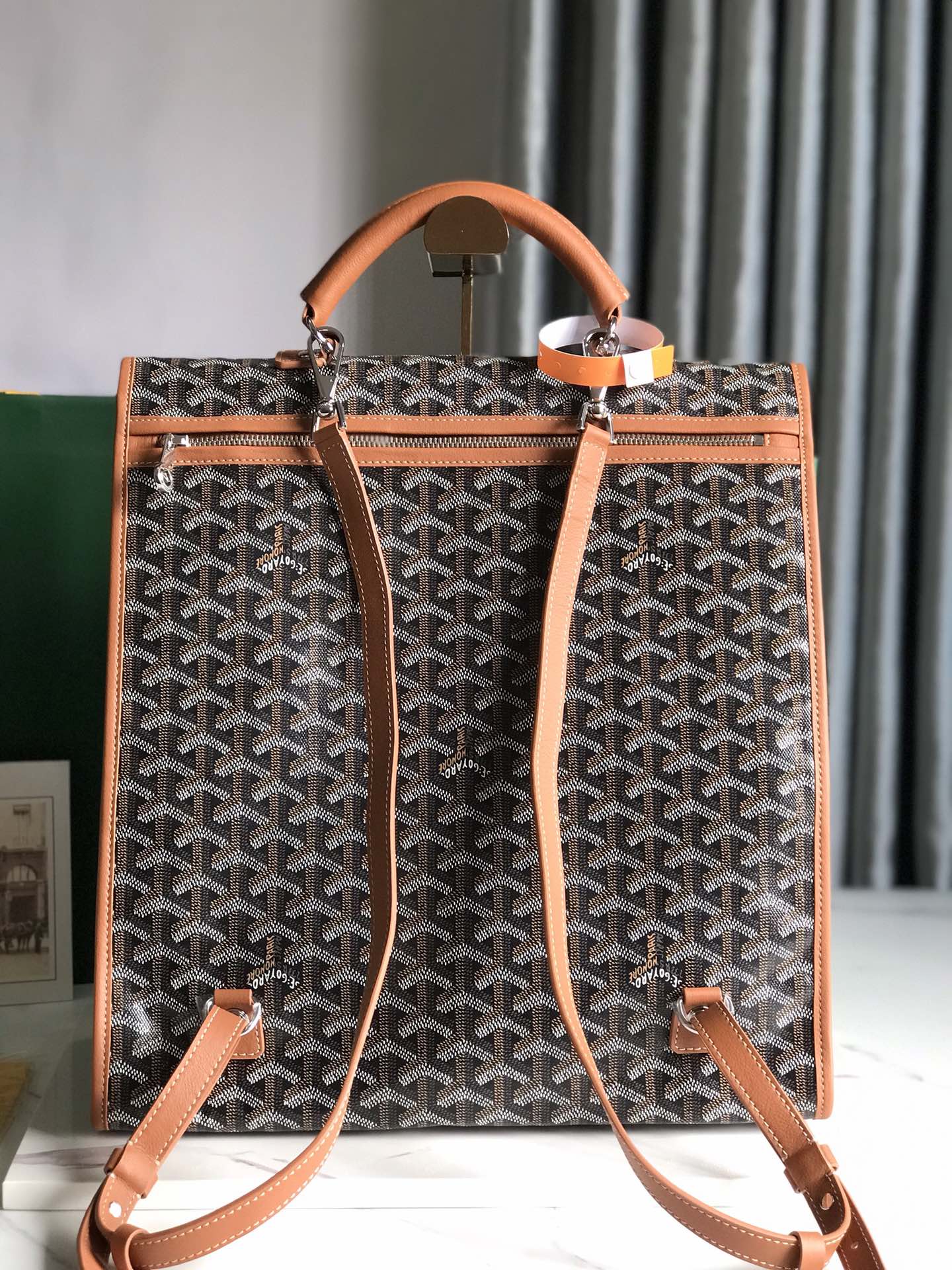 GOYARD SAINT LÉGER BACKPACK 35 IN BROWN GOYARDINE CANVAS AND CALFSKIN WITH CARTOON PATCH