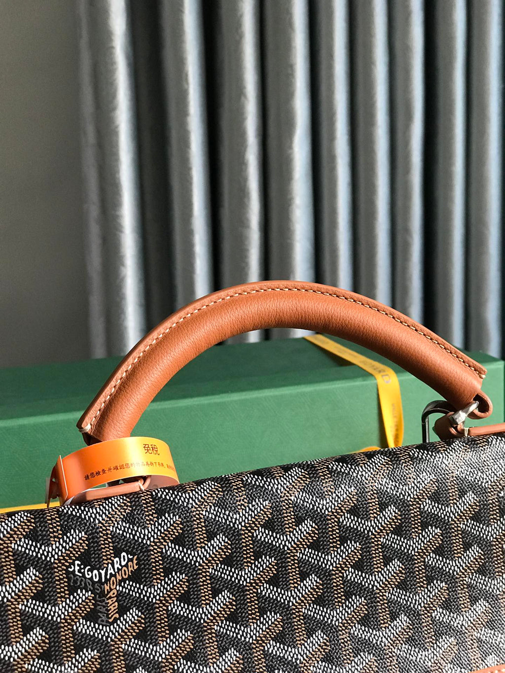 GOYARD SAINT LÉGER BACKPACK 35 IN BROWN GOYARDINE CANVAS AND CALFSKIN WITH CARTOON PATCH