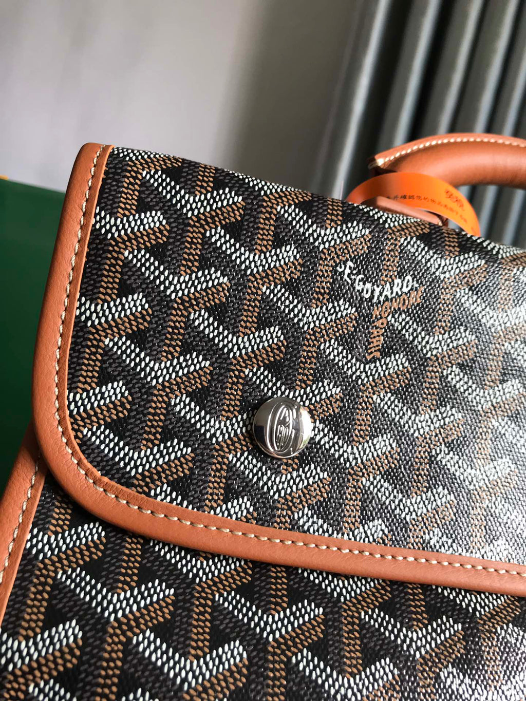 GOYARD SAINT LÉGER BACKPACK 35 IN BROWN GOYARDINE CANVAS AND CALFSKIN WITH CARTOON PATCH