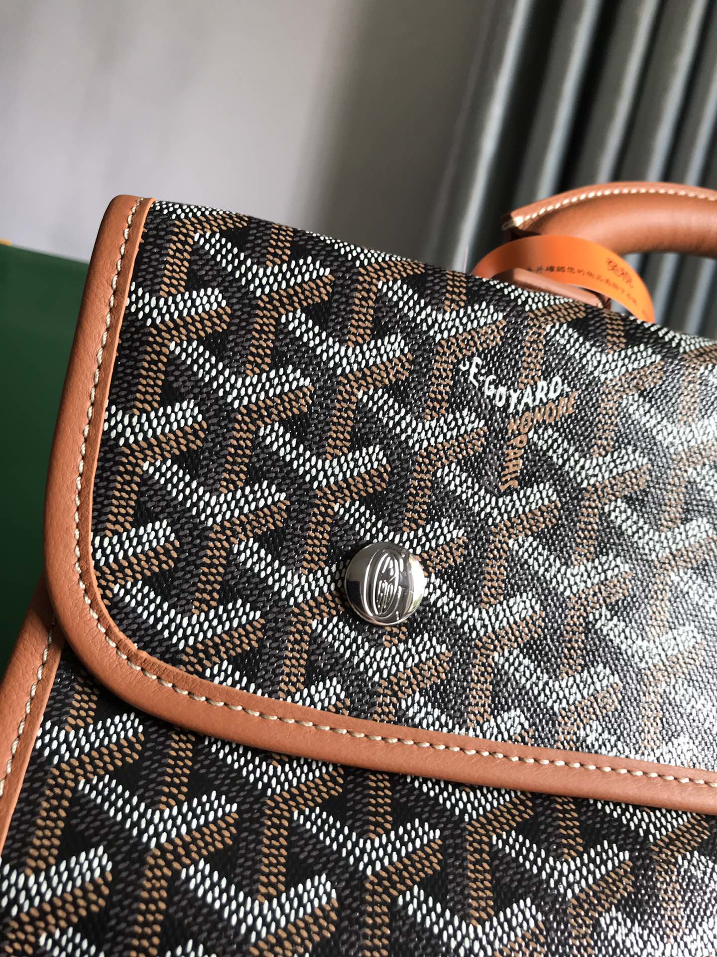 GOYARD SAINT LÉGER BACKPACK 35 IN BROWN GOYARDINE CANVAS AND CALFSKIN WITH CARTOON PATCH