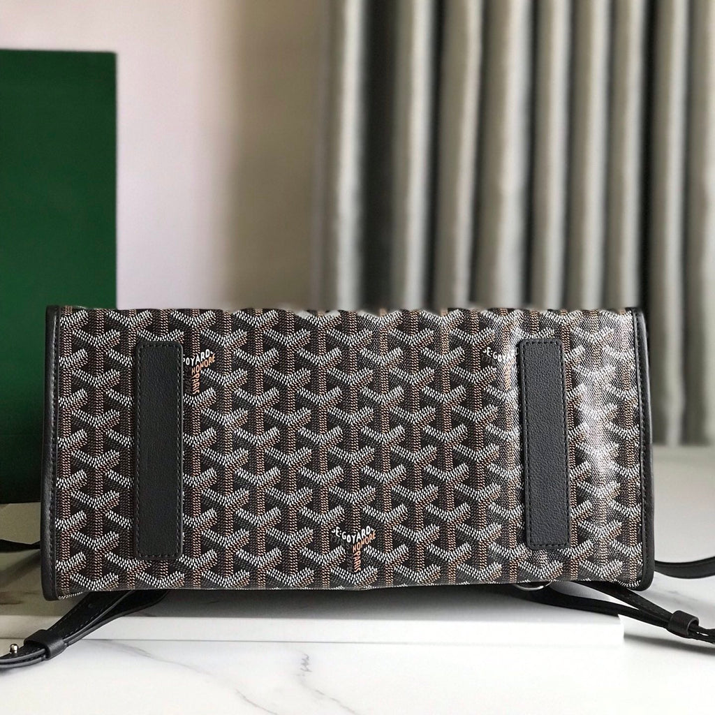 GOYARD SAINT LÉGER BACKPACK 35 IN BROWN MIX BALCK GOYARDINE CANVAS AND CALFSKIN WITH CARTOON PATCH