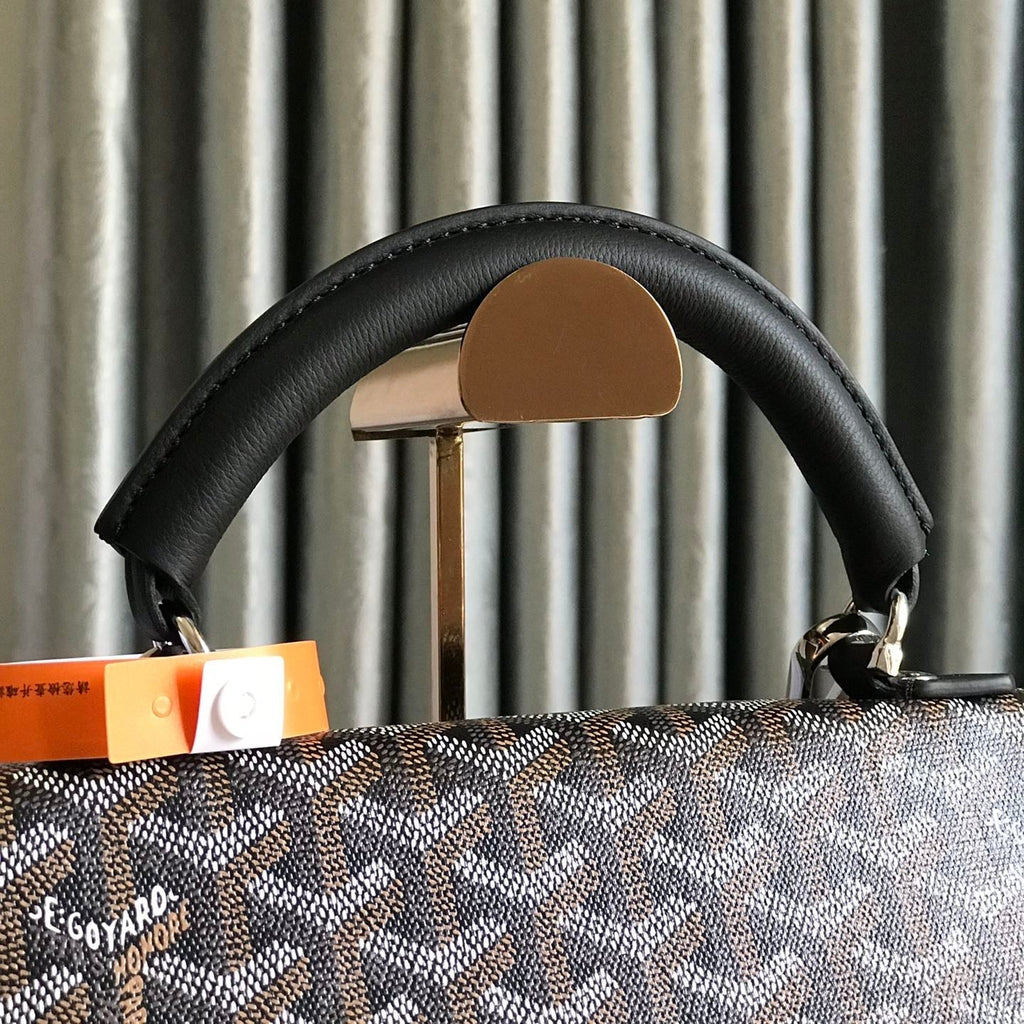 GOYARD SAINT LÉGER BACKPACK 35 IN BROWN MIX BALCK GOYARDINE CANVAS AND CALFSKIN WITH CARTOON PATCH