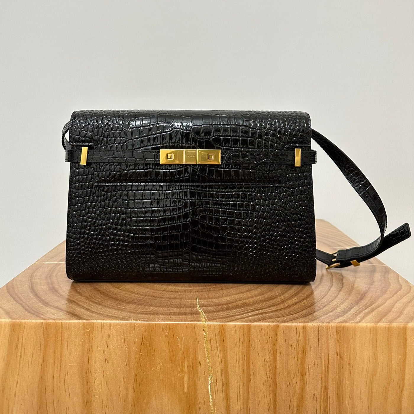 SAINT LAURENT MANHATTAN 29 TOP-HANDLE IN CROCODILE BLACK CALFSKIN