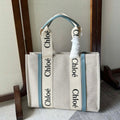 CHLOE LAGRE WOODY TOTE BAG 45 IN BEIGE LINEN CANVAS BLACK WEBBING LOGO EMBROIDER BLUE CALFSKIN