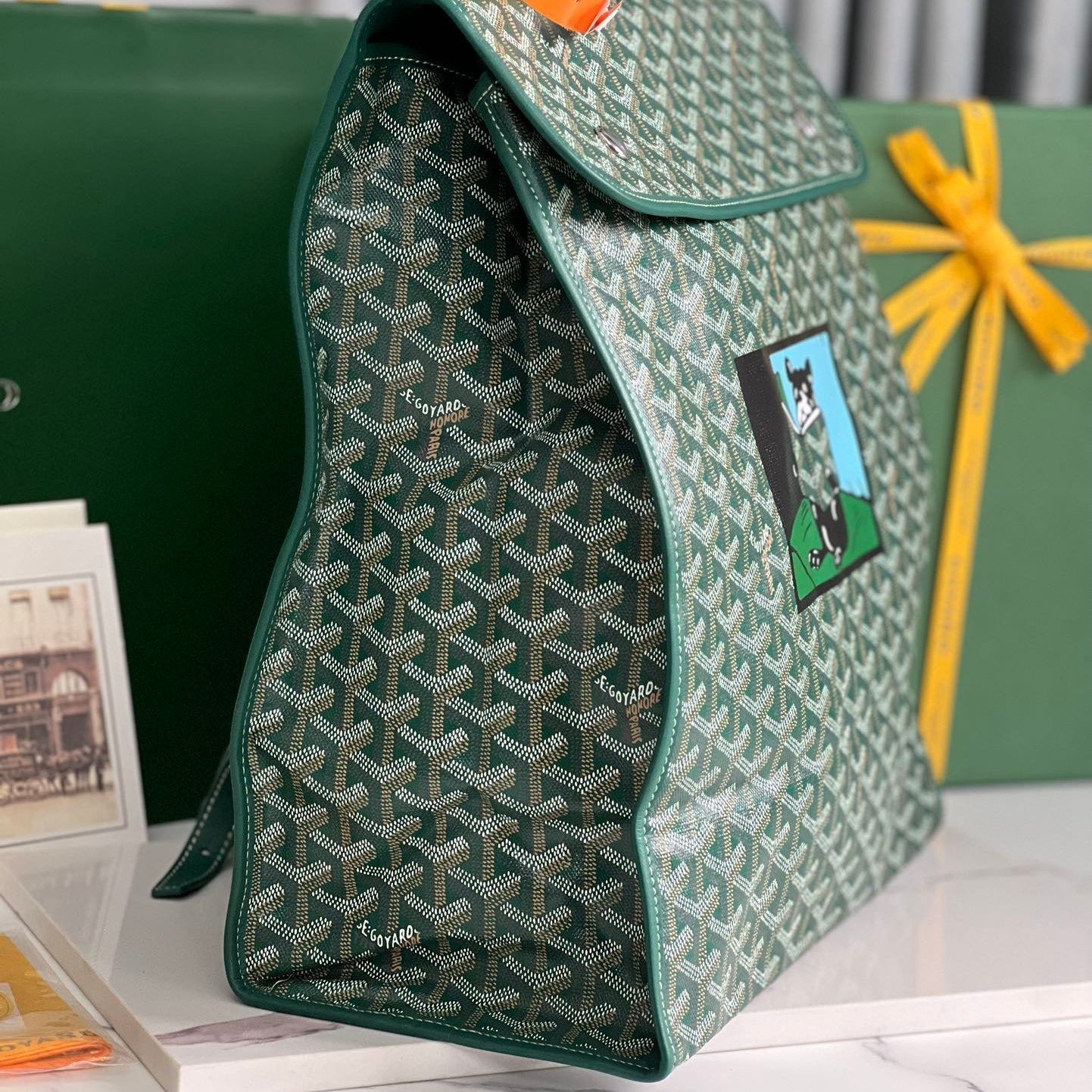GOYARD SAINT LÉGER BACKPACK 35 IN GREEN GOYARDINE CANVAS AND CALFSKIN WITH CARTOON PATCH