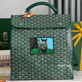 GOYARD SAINT LÉGER BACKPACK 35 IN GREEN GOYARDINE CANVAS AND CALFSKIN WITH CARTOON PATCH