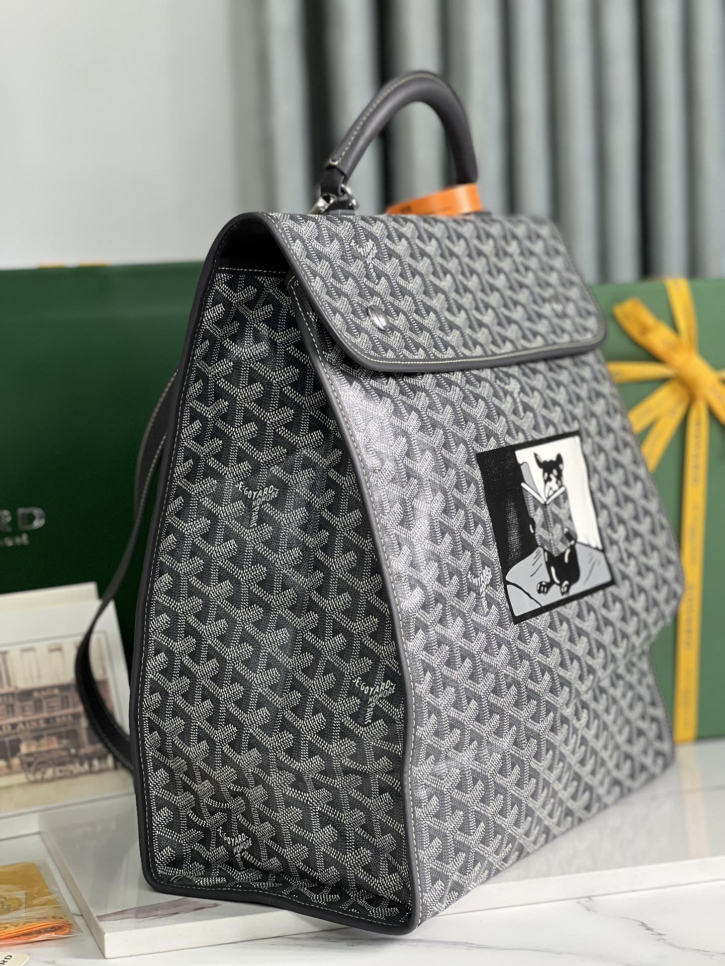 GOYARD SAINT LÉGER BACKPACK 35 IN BLACK GOYARDINE CANVAS AND CALFSKIN WITH CARTOON PATCH