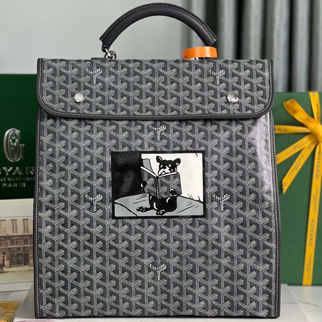 GOYARD SAINT LÉGER BACKPACK 35 IN BLACK GOYARDINE CANVAS AND CALFSKIN WITH CARTOON PATCH