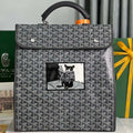 GOYARD SAINT LÉGER BACKPACK 35 IN BLACK GOYARDINE CANVAS AND CALFSKIN WITH CARTOON PATCH
