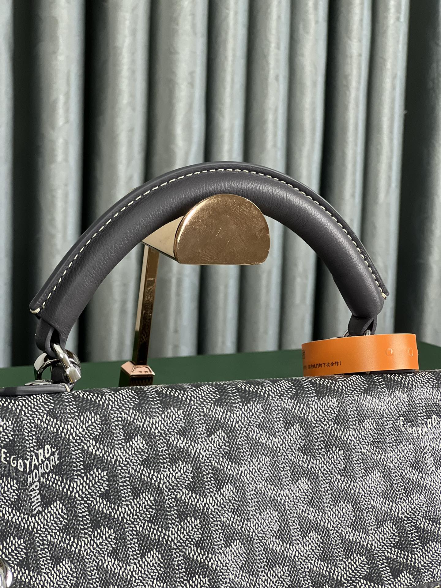 GOYARD SAINT LÉGER BACKPACK 35 IN BLACK GOYARDINE CANVAS AND CALFSKIN WITH CARTOON PATCH