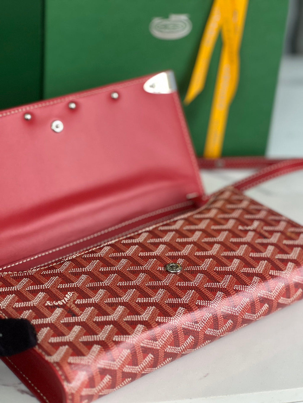 GOYARD MONTE-CARLO PM CLUTCH 25 IN CLASSIC RED GOYARDINE CANVAS