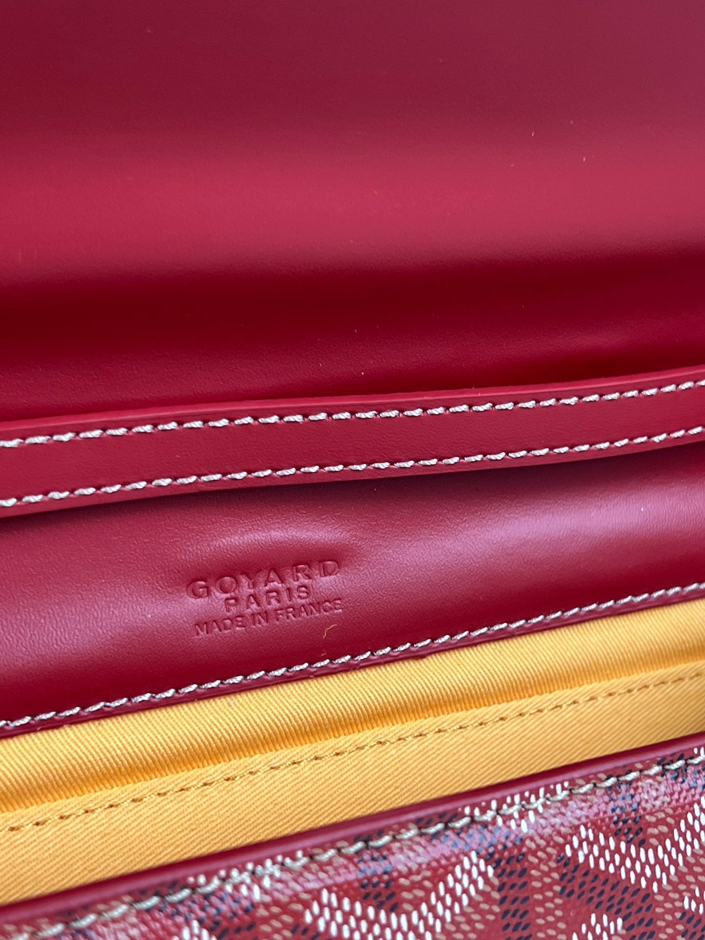 GOYARD MONTE-CARLO PM CLUTCH 25 IN CLASSIC RED GOYARDINE CANVAS