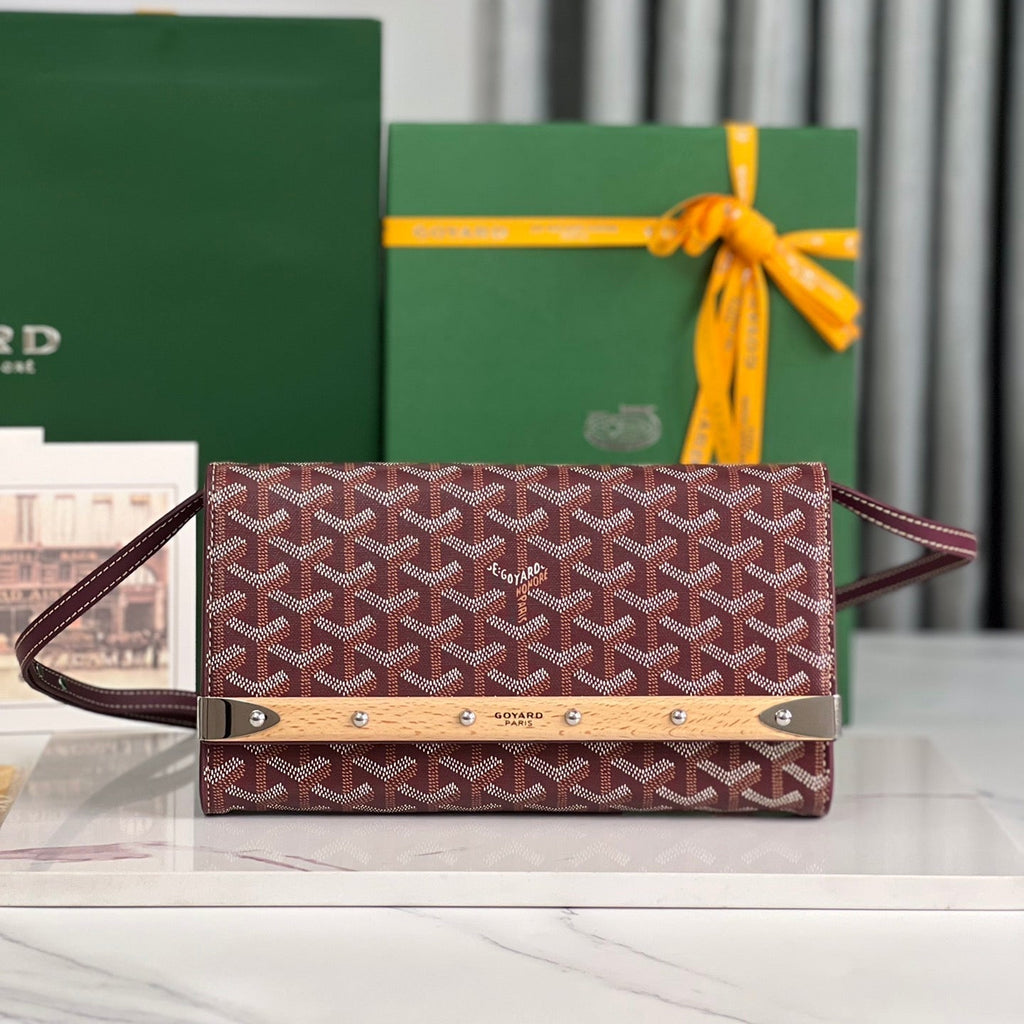 GOYARD MONTE-CARLO PM CLUTCH 25 IN WINE RED GOYARDINE CANVAS