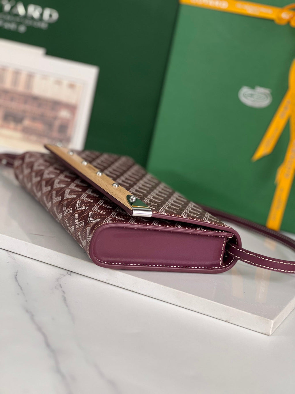 GOYARD MONTE-CARLO PM CLUTCH 25 IN WINE RED GOYARDINE CANVAS