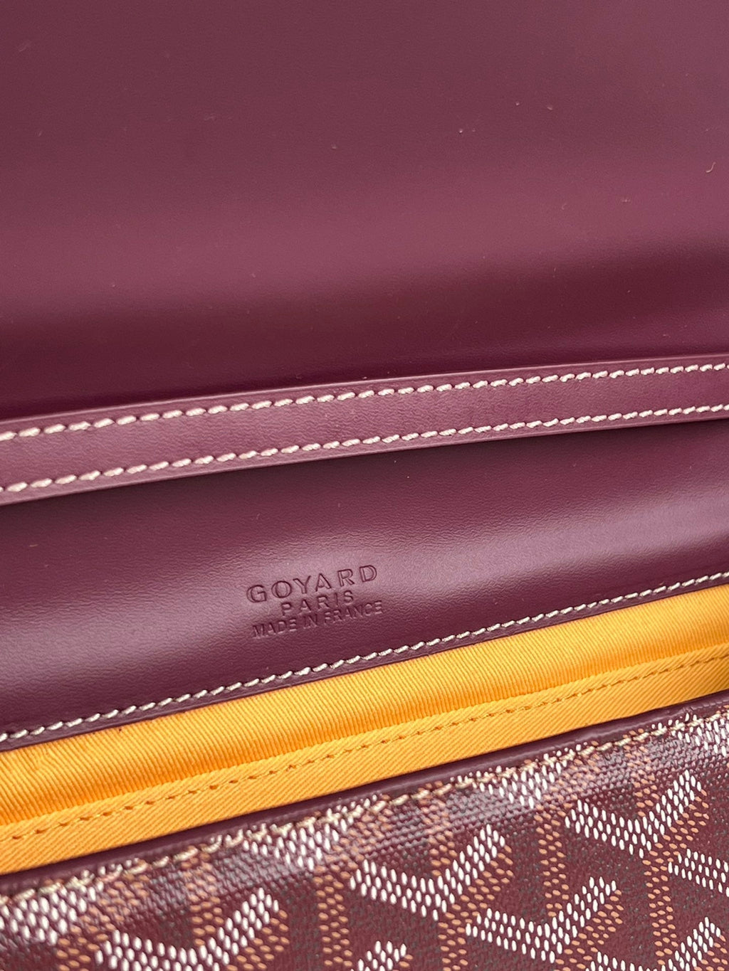 GOYARD MONTE-CARLO PM CLUTCH 25 IN WINE RED GOYARDINE CANVAS