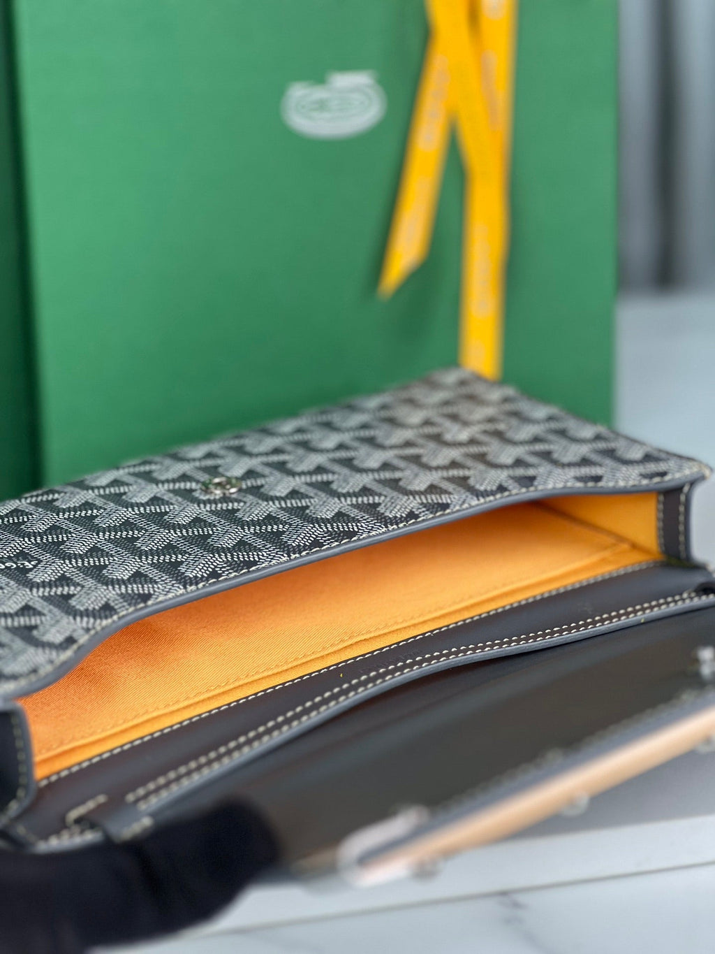 GOYARD MONTE-CARLO PM CLUTCH 25 IN GRAY GOYARDINE CANVAS