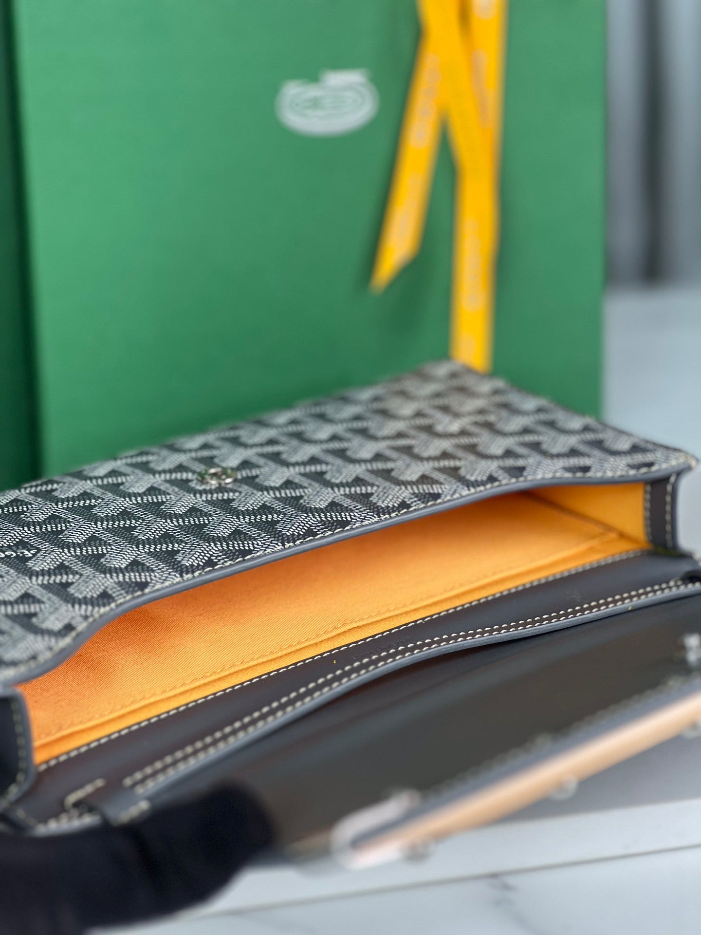 GOYARD MONTE-CARLO PM CLUTCH 25 IN GRAY GOYARDINE CANVAS