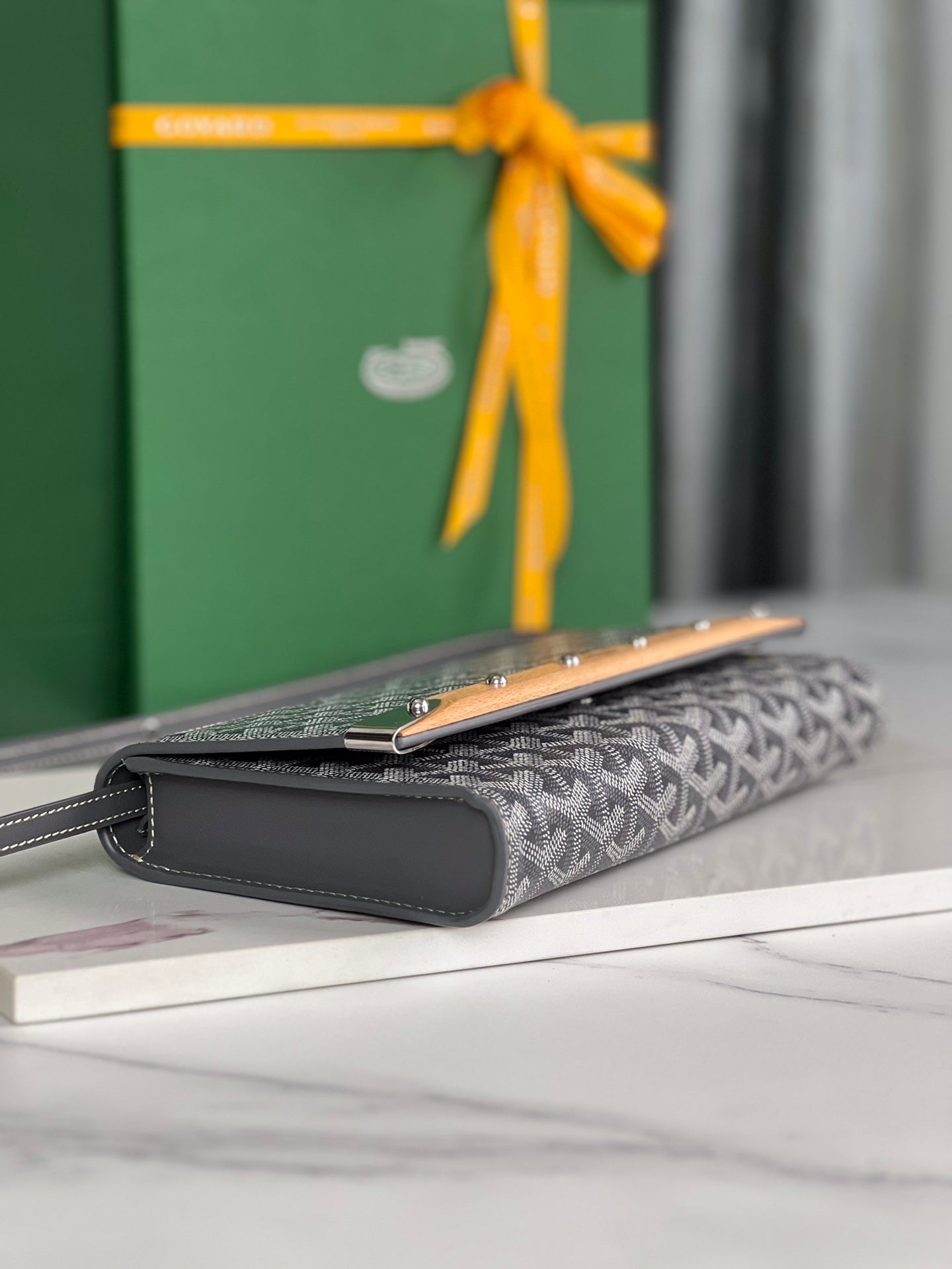 GOYARD MONTE-CARLO PM CLUTCH 25 IN GRAY GOYARDINE CANVAS