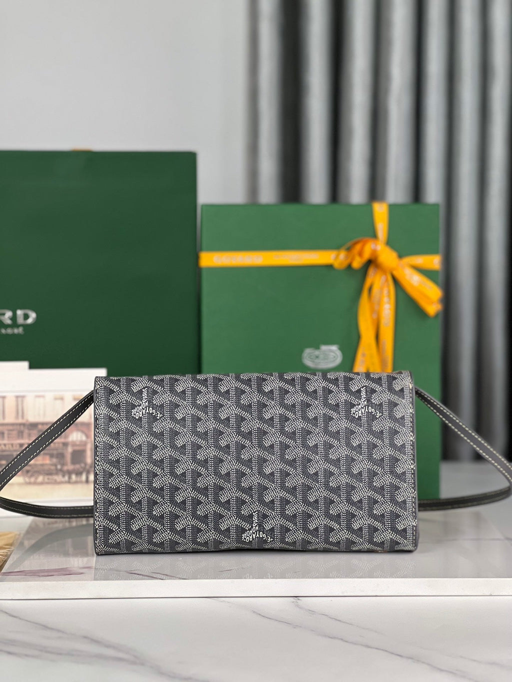 GOYARD MONTE-CARLO PM CLUTCH 25 IN GRAY GOYARDINE CANVAS