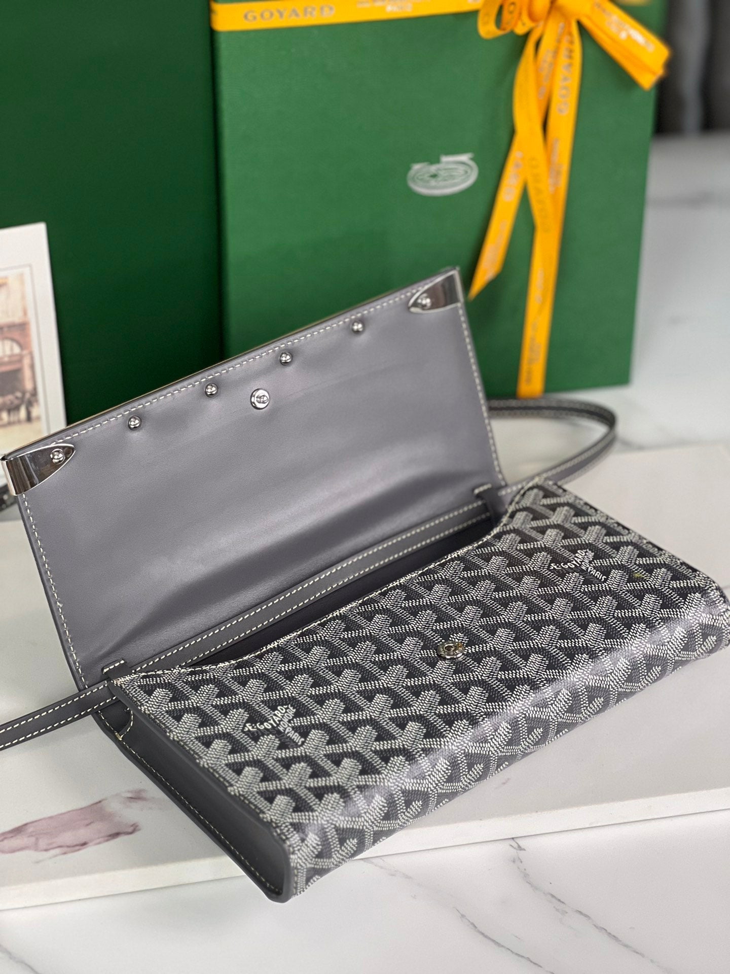 GOYARD MONTE-CARLO PM CLUTCH 25 IN GRAY GOYARDINE CANVAS