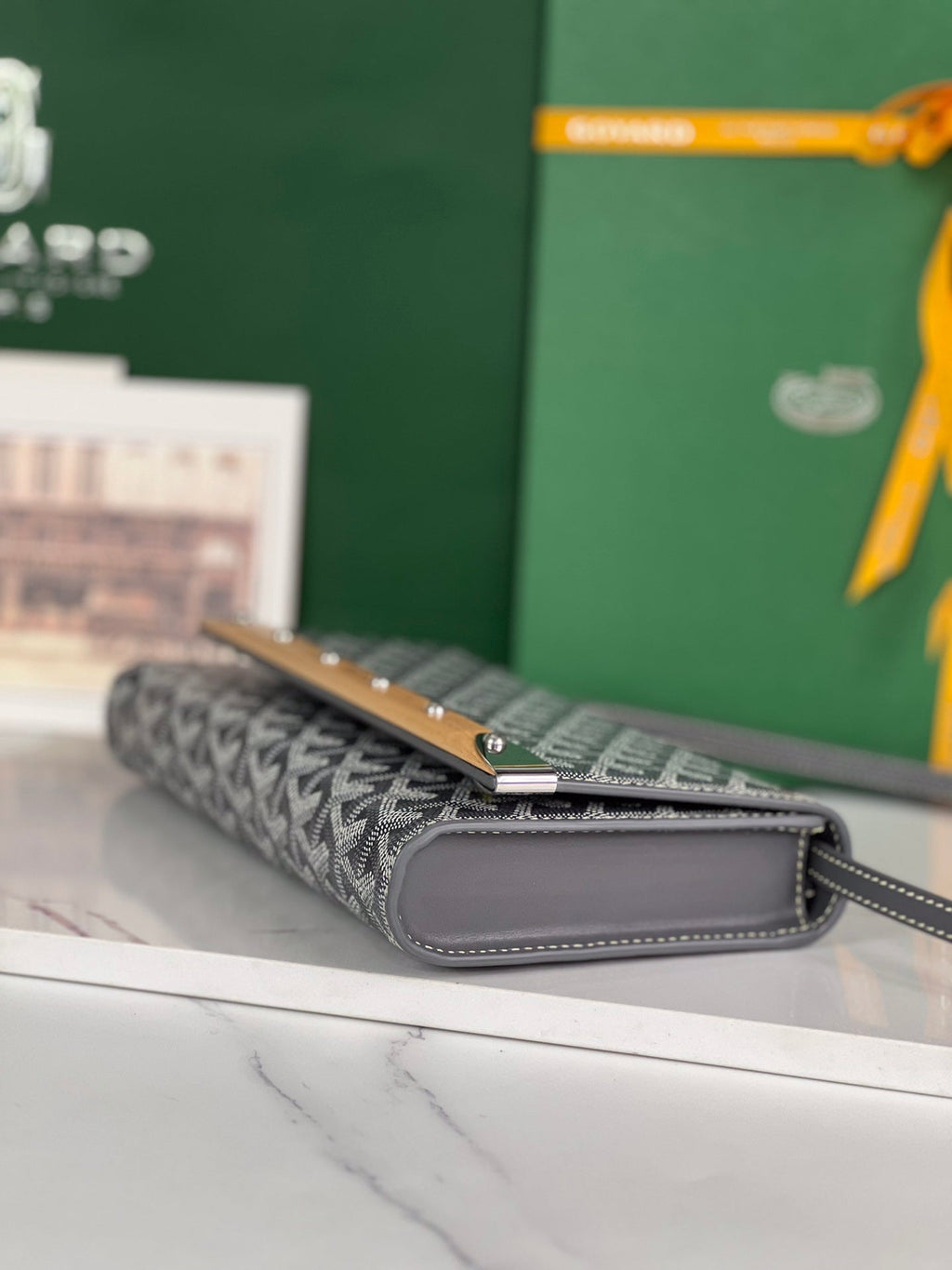 GOYARD MONTE-CARLO PM CLUTCH 25 IN GRAY GOYARDINE CANVAS