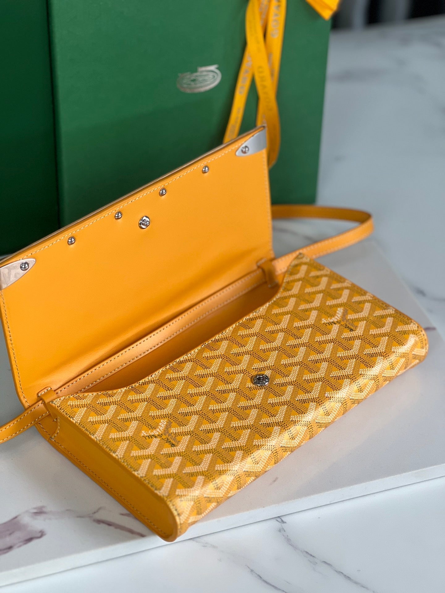 GOYARD MONTE-CARLO PM CLUTCH 25 IN YELLOW GOYARDINE CANVAS
