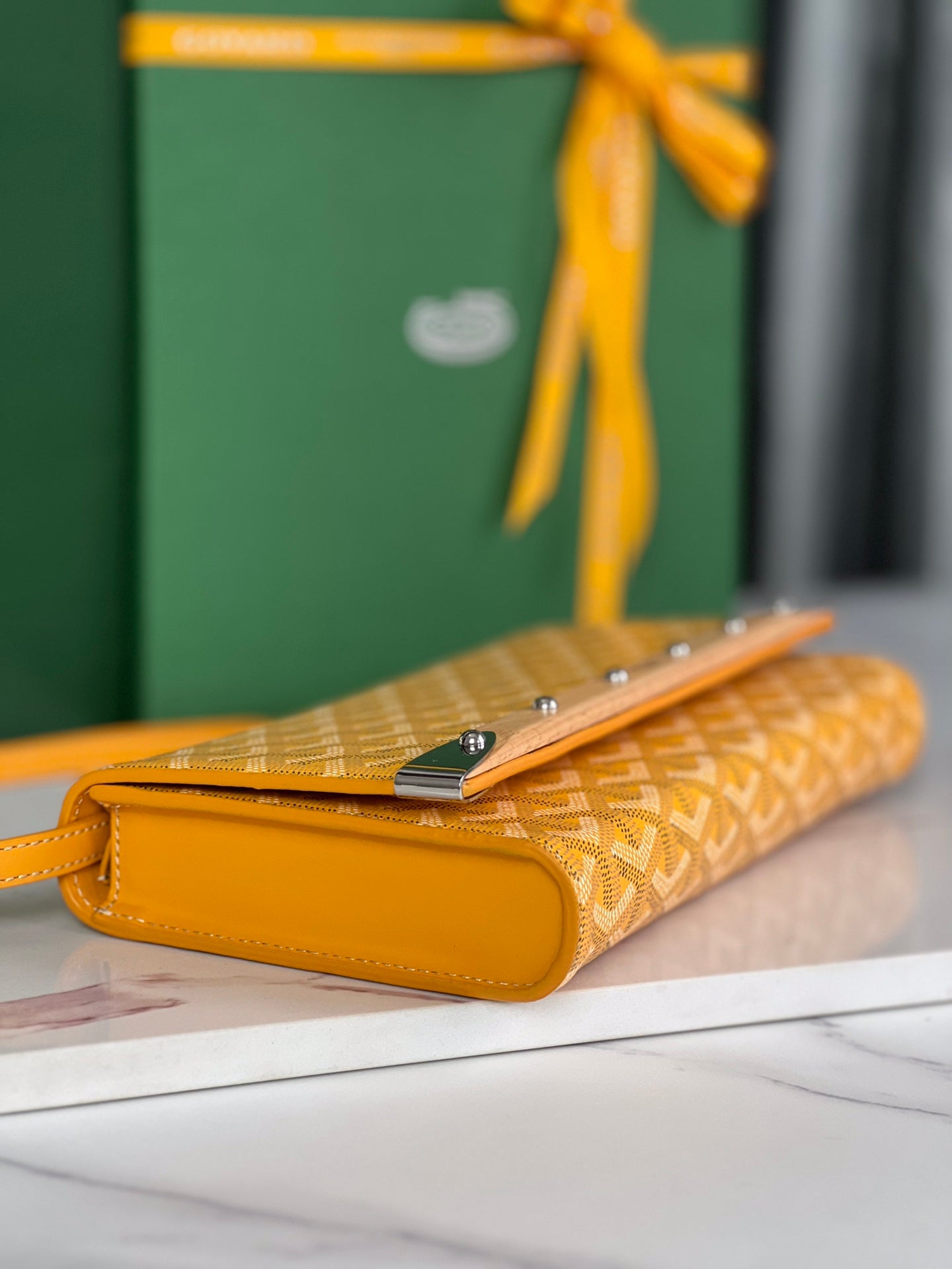 GOYARD MONTE-CARLO PM CLUTCH 25 IN YELLOW GOYARDINE CANVAS