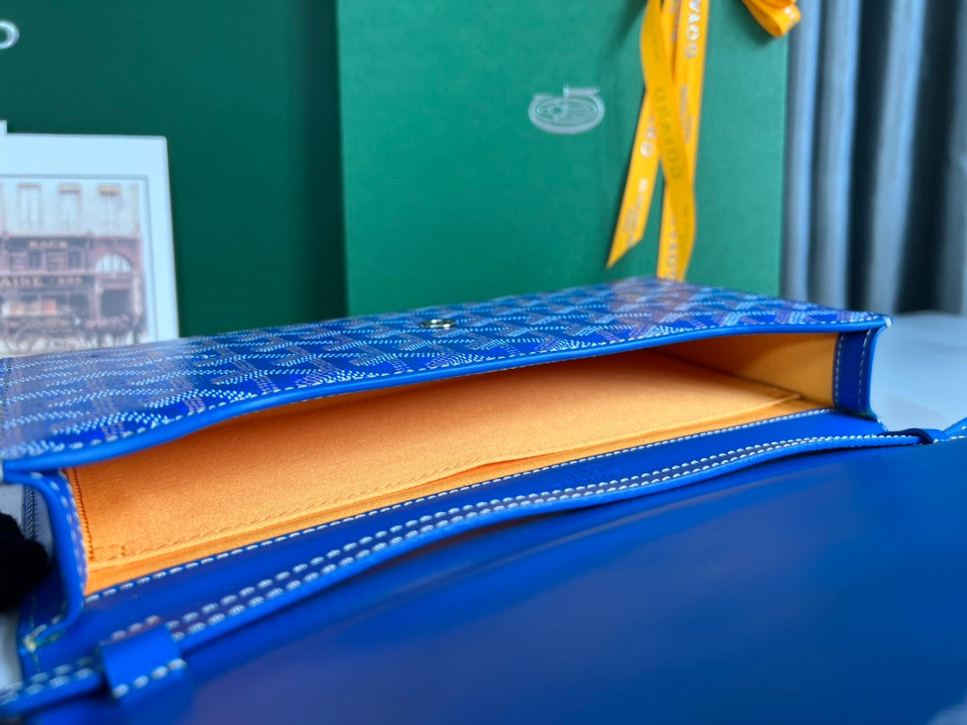 GOYARD MONTE-CARLO PM CLUTCH 25 IN SAPPHIRE BLUE GOYARDINE CANVAS