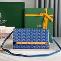 GOYARD MONTE-CARLO PM CLUTCH 25 IN SAPPHIRE BLUE GOYARDINE CANVAS
