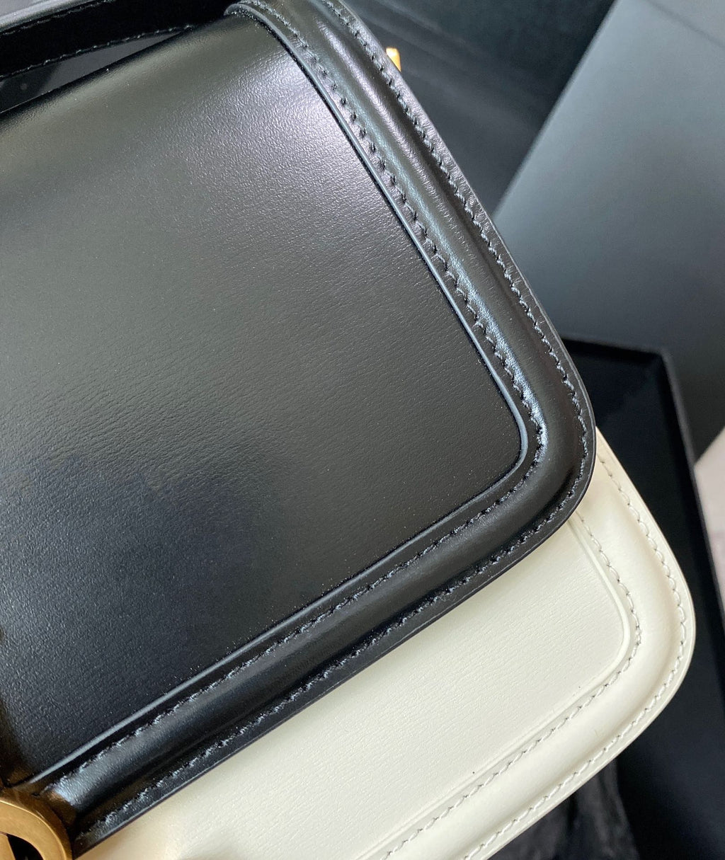 SAINT LAURENT SOLFERINO MEDIUM SATCHEL 23 IN BLACK MIX WHITE CALFSKIN GOLD LOGO