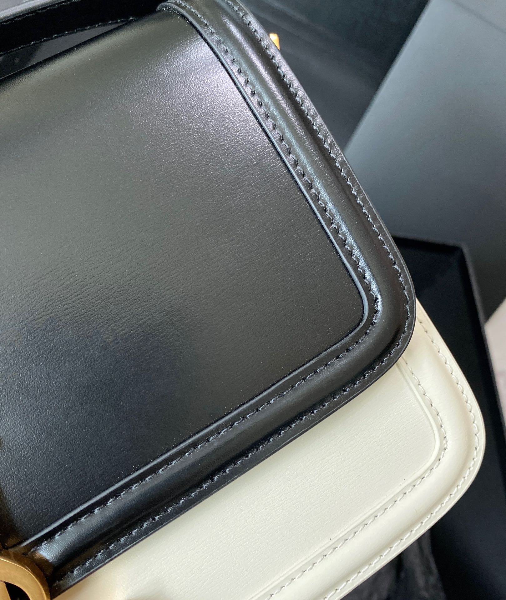 SAINT LAURENT SOLFERINO MEDIUM SATCHEL 23 IN BLACK MIX WHITE CALFSKIN GOLD LOGO