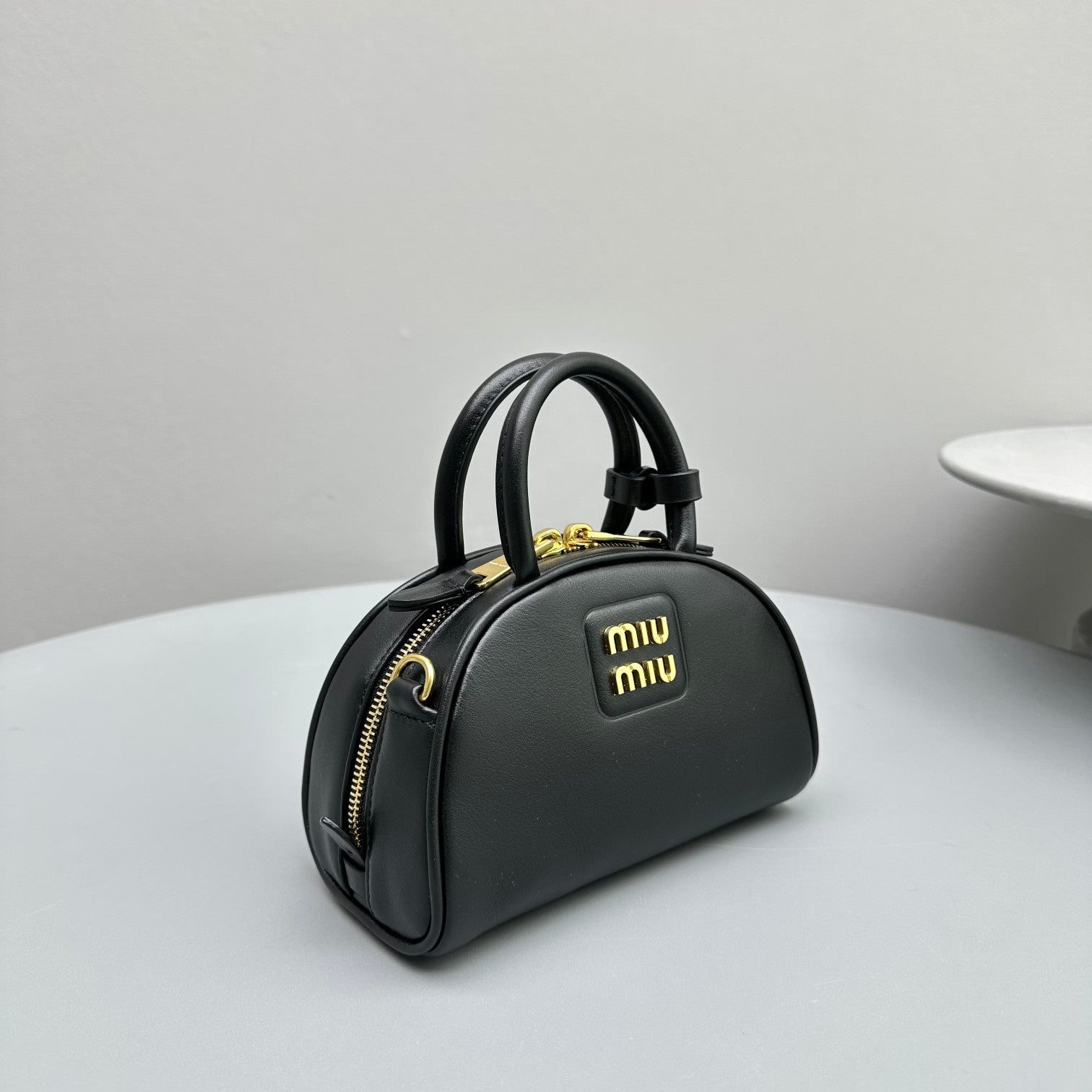 MIU MIU TOP-HANDLE 18 BAG IN BLACK CALFSKIN