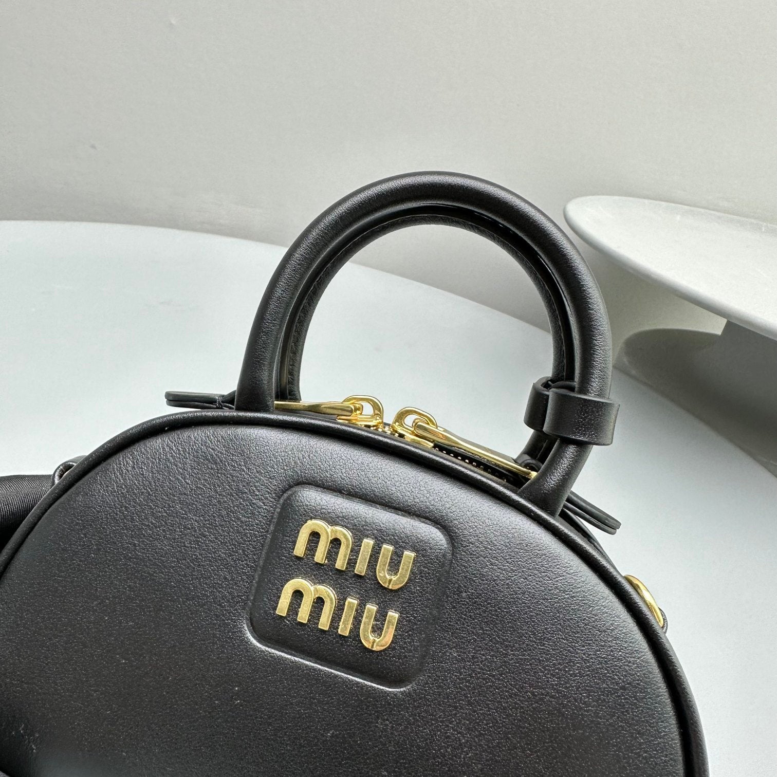 MIU MIU TOP-HANDLE 18 BAG IN BLACK CALFSKIN