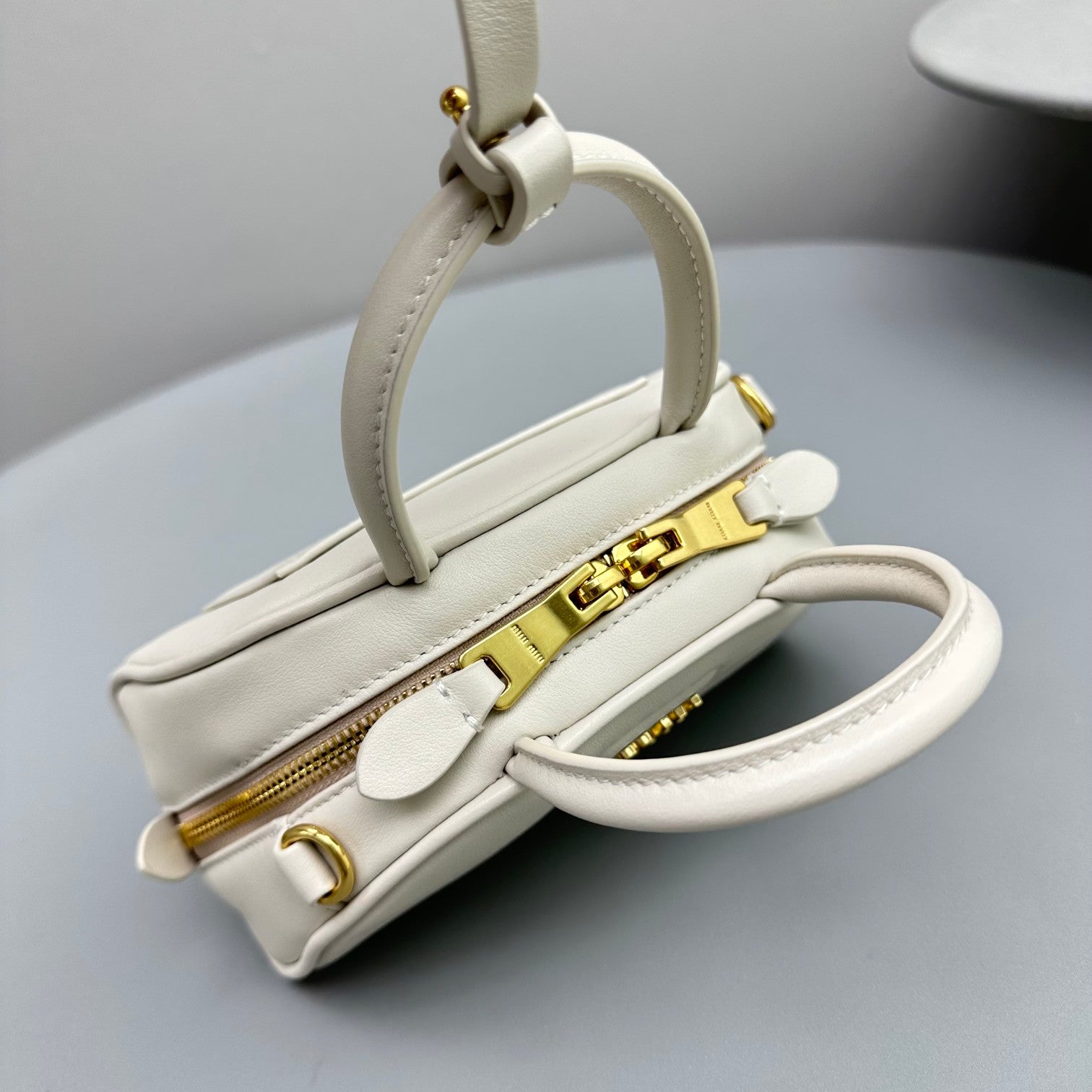 MIU MIU TOP-HANDLE 18 BAG IN WHITE CALFSKIN