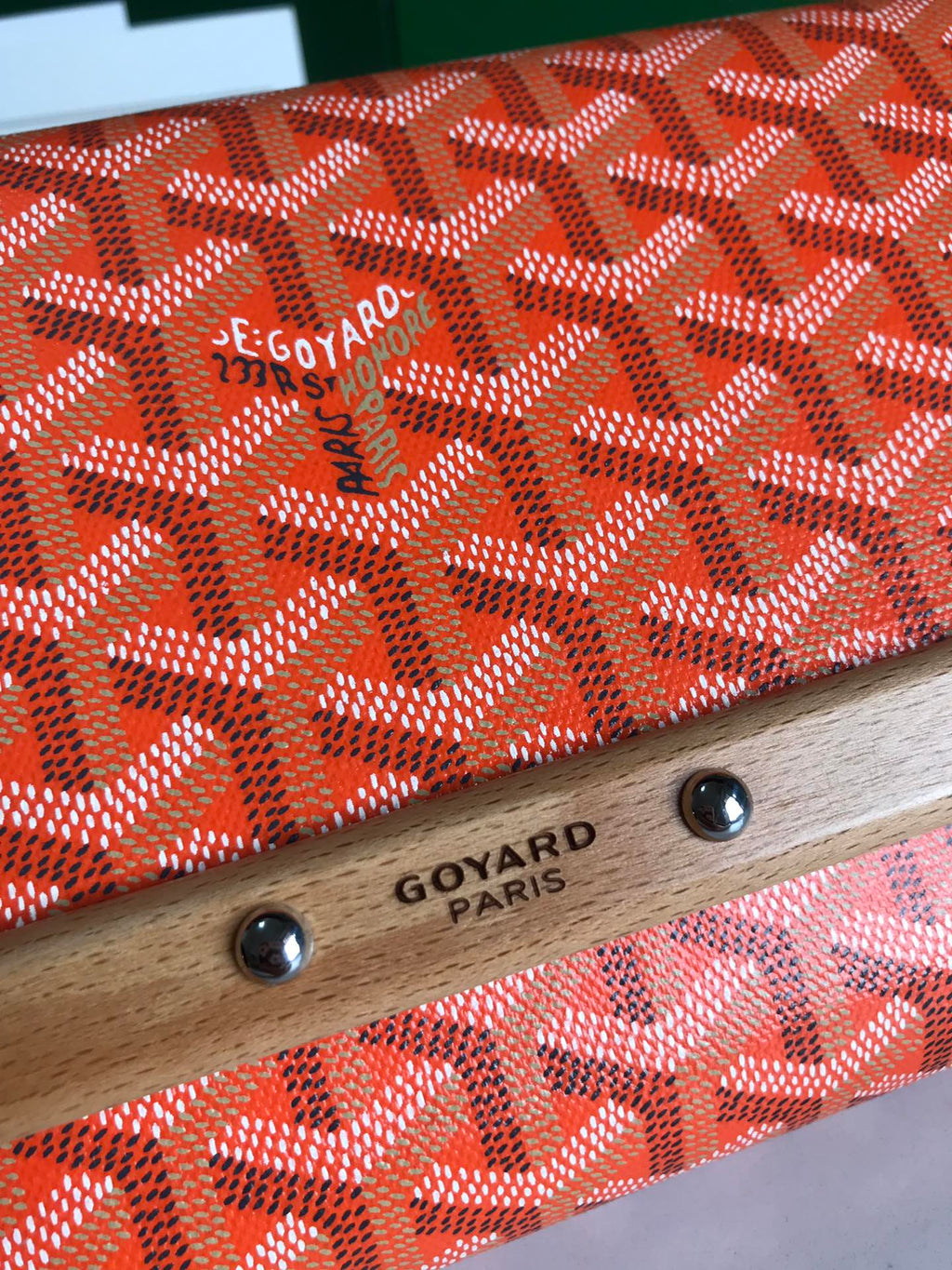 GOYARD MONTE-CARLO PM CLUTCH 25 IN ORANGE GOYARDINE CANVAS