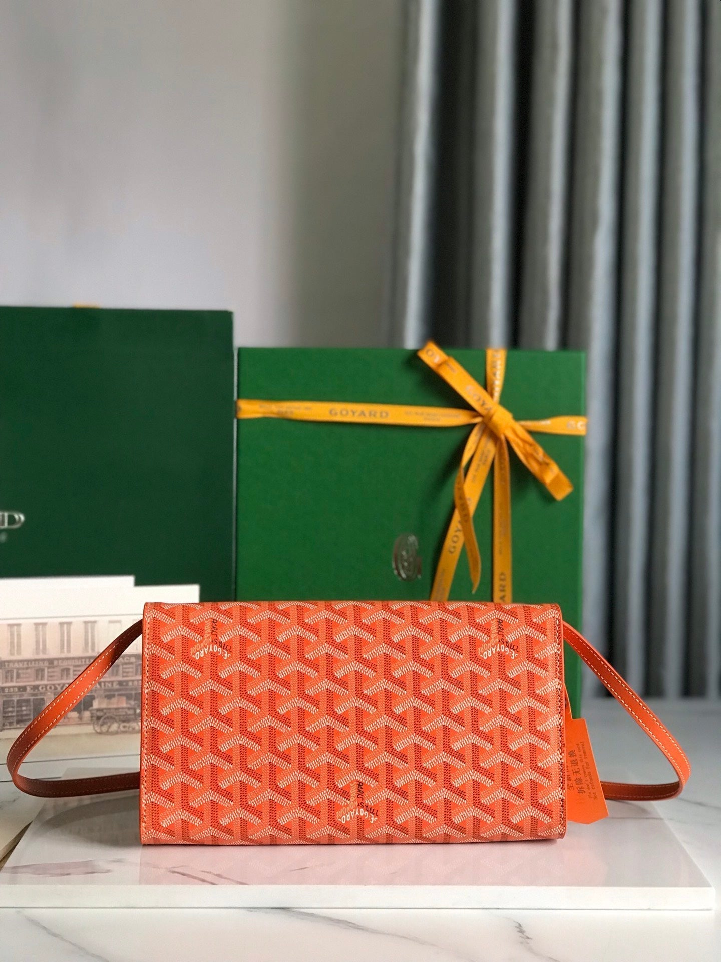 GOYARD MONTE-CARLO PM CLUTCH 25 IN ORANGE GOYARDINE CANVAS