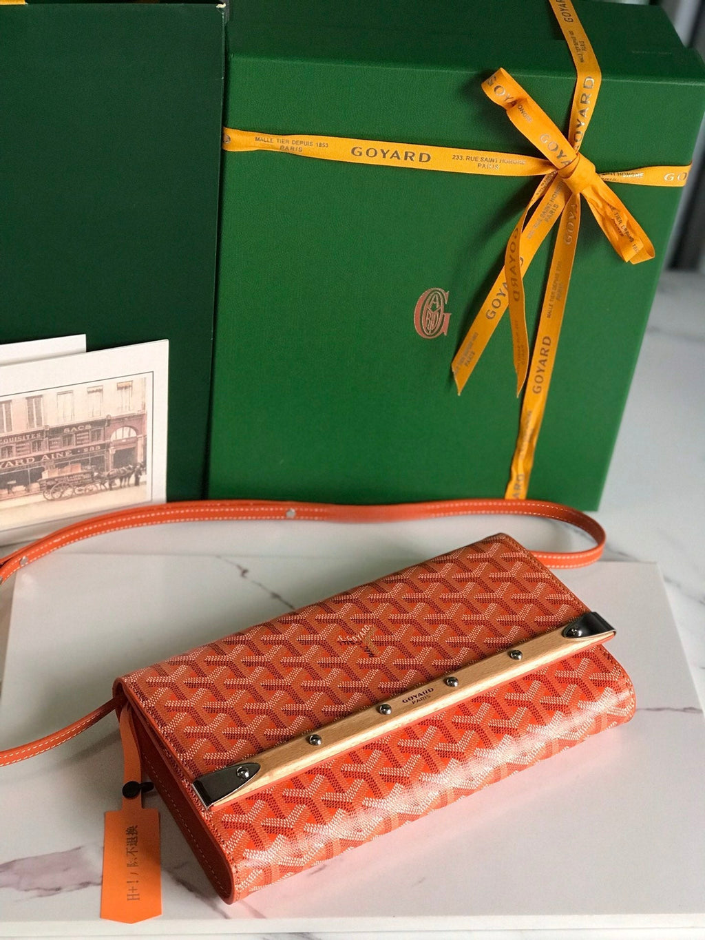 GOYARD MONTE-CARLO PM CLUTCH 25 IN ORANGE GOYARDINE CANVAS