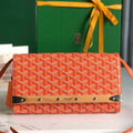GOYARD MONTE-CARLO PM CLUTCH 25 IN ORANGE GOYARDINE CANVAS