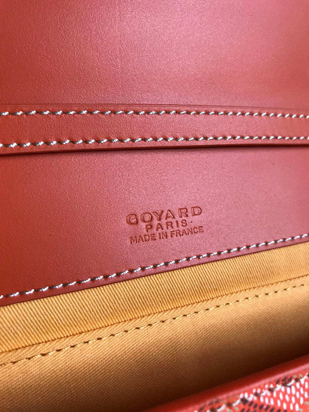 GOYARD MONTE-CARLO PM CLUTCH 25 IN ORANGE GOYARDINE CANVAS