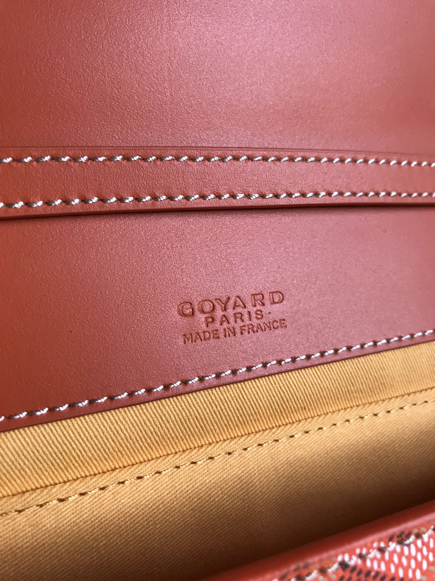 GOYARD MONTE-CARLO PM CLUTCH 25 IN ORANGE GOYARDINE CANVAS