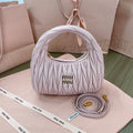 MIU MIU WANDER MATELASSÉ NAPPA HOBO BAG 23 IN PASTEL PINK LAMBSKIN