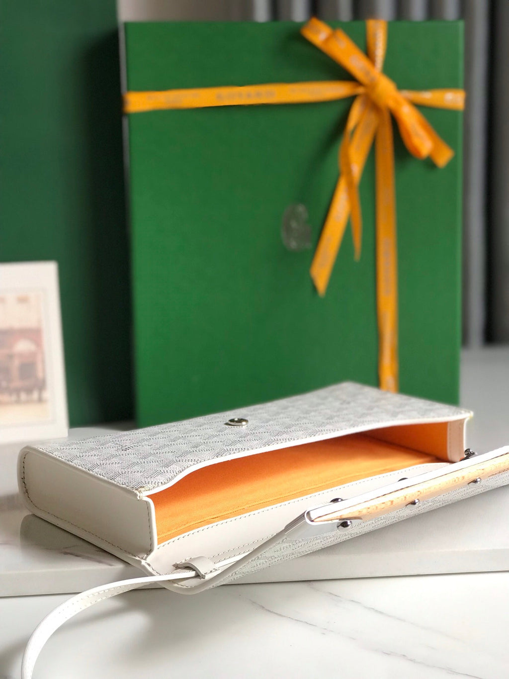 GOYARD MONTE-CARLO PM CLUTCH 25 IN WHITE GOYARDINE CANVAS