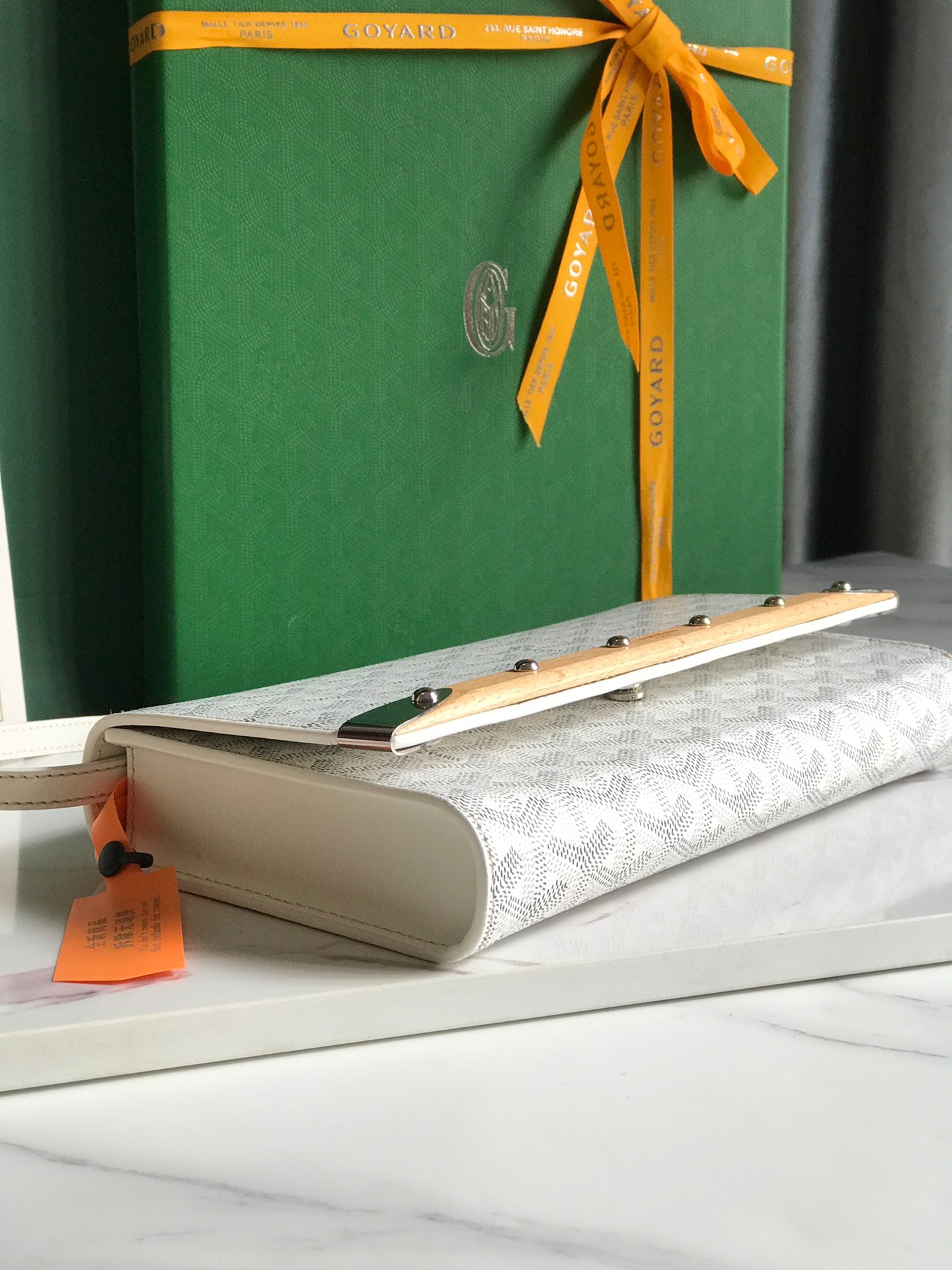 GOYARD MONTE-CARLO PM CLUTCH 25 IN WHITE GOYARDINE CANVAS