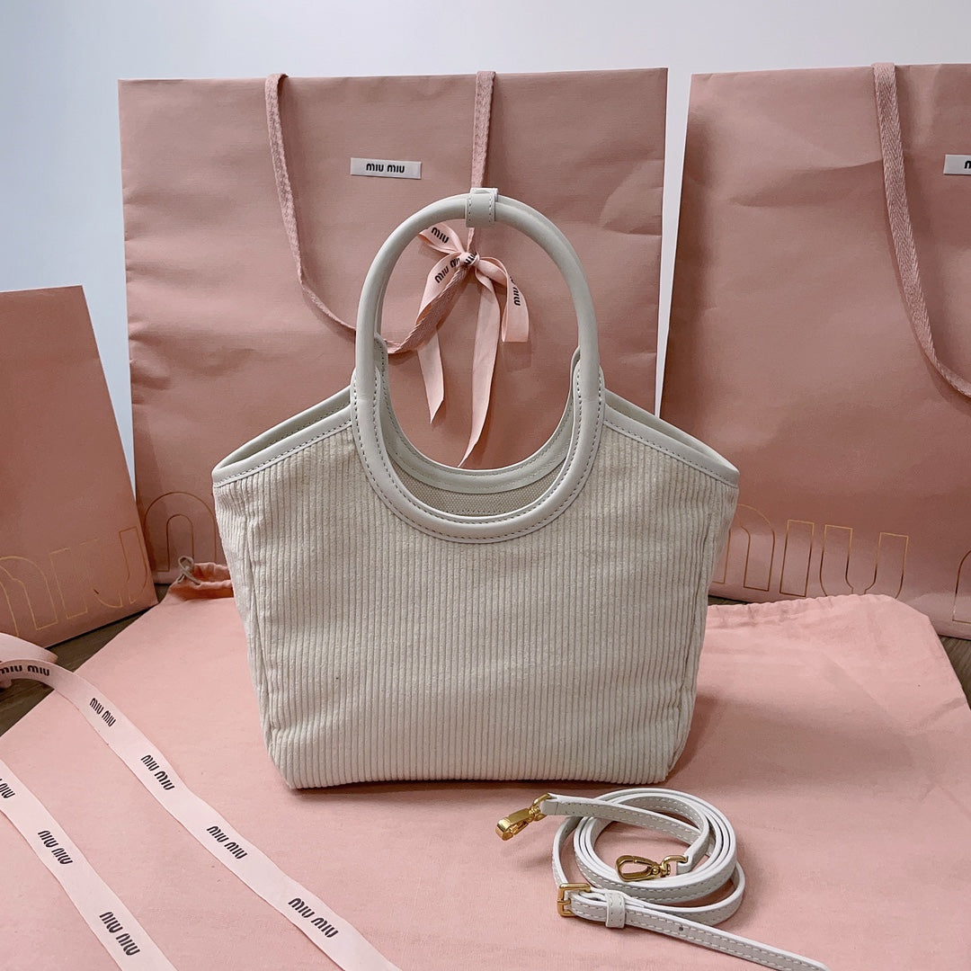 MIU MIU IVY HANDBAG 22 IN WHITE CANVAS