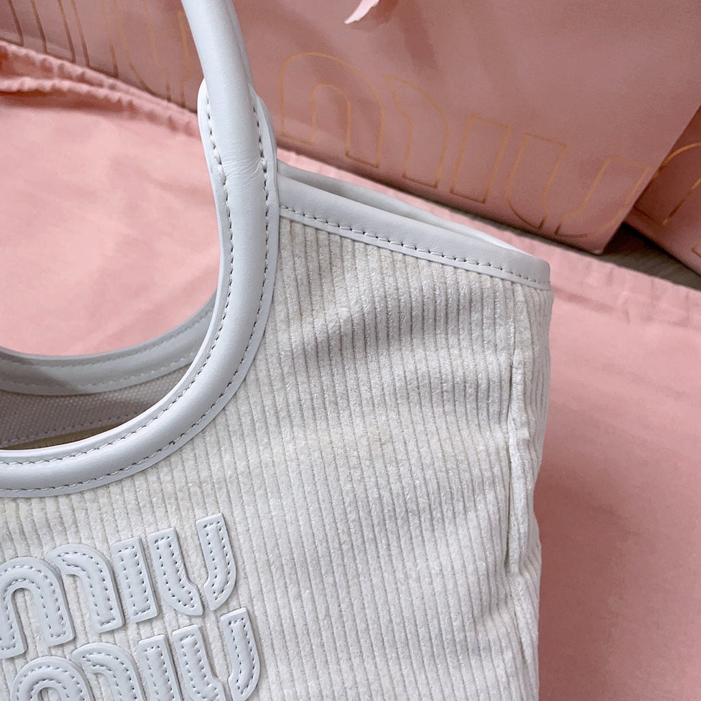 MIU MIU IVY HANDBAG 22 IN WHITE CANVAS