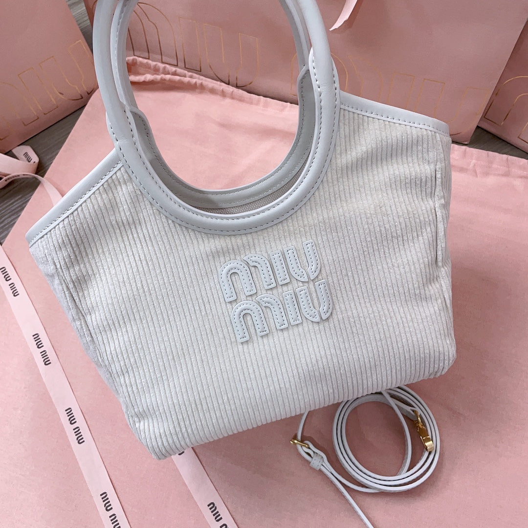 MIU MIU IVY HANDBAG 22 IN WHITE CANVAS