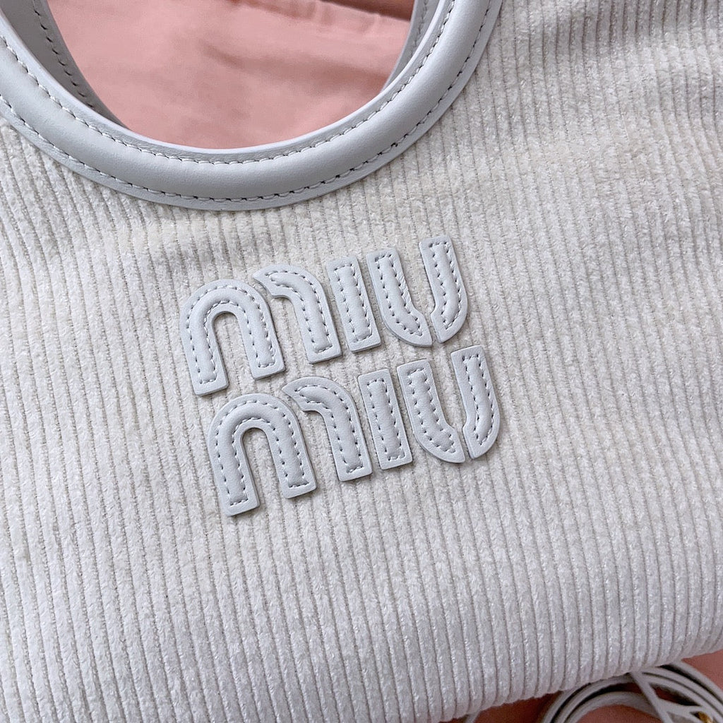 MIU MIU IVY HANDBAG 22 IN WHITE CANVAS