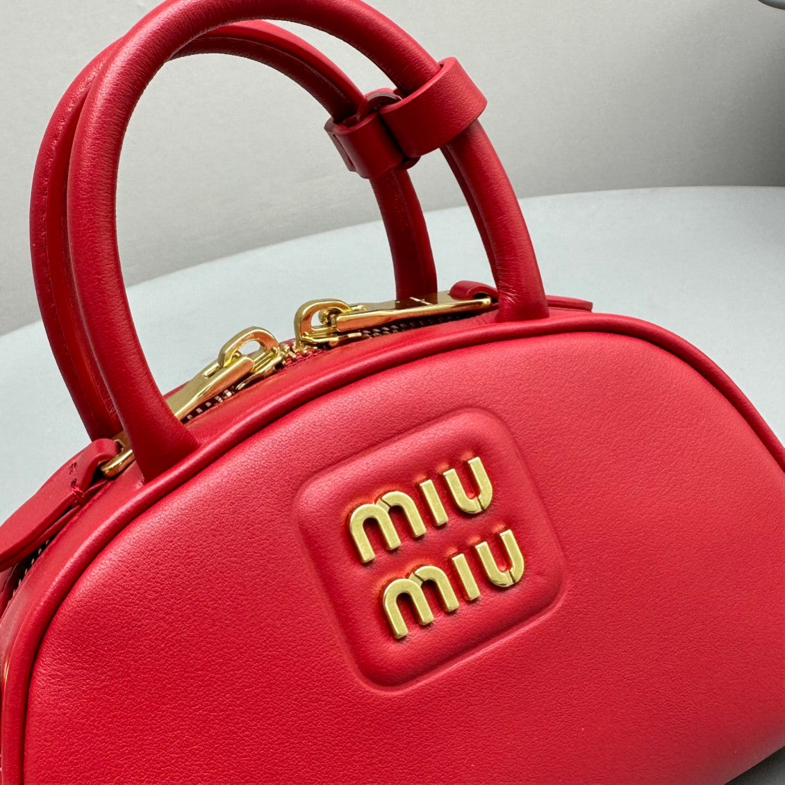 MIU MIU TOP-HANDLE 18 BAG IN RED CALFSKIN