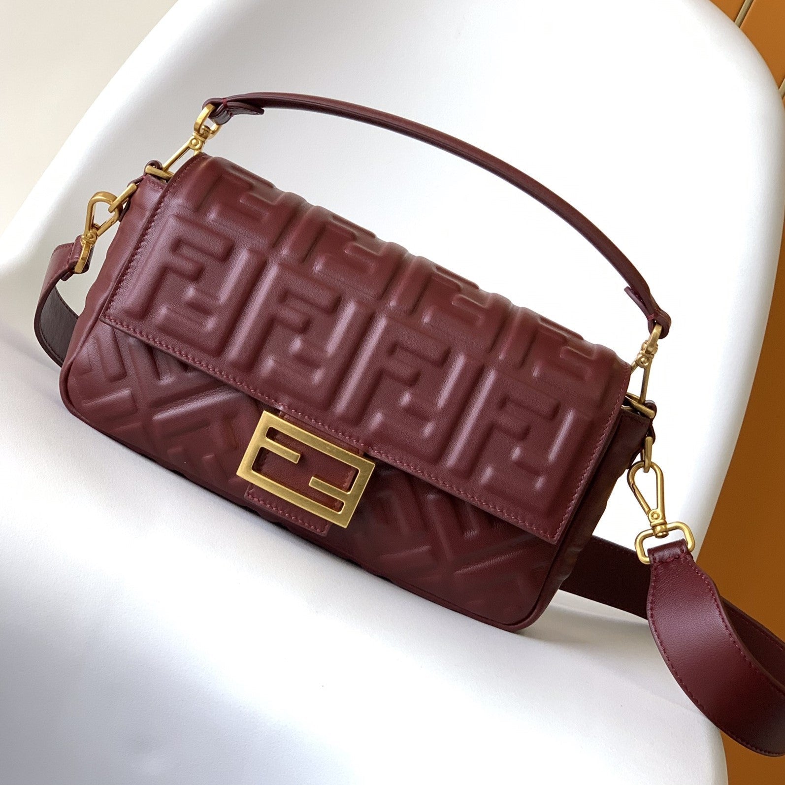 FENDI Fend Baguette 27 Bag With FF Motif Burgundy Leather Ghw